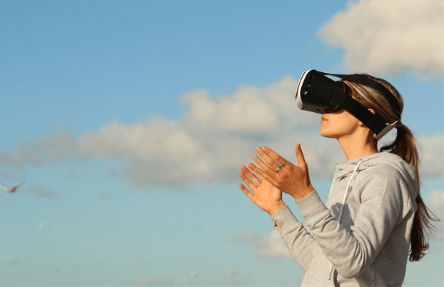 woman experiencing VR outside